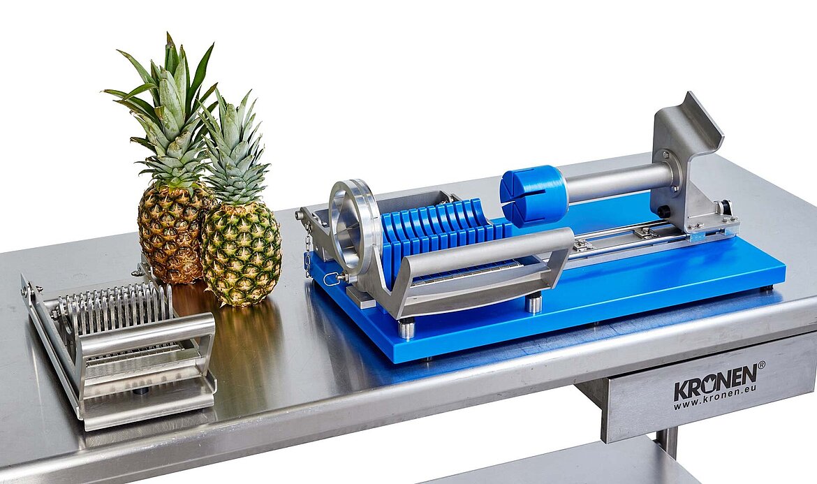 Der manuelle Ananas-Stückeschneider MPC 100 ist eine Weiterentwicklung des manuellen Ananas-Scheibenschneiders