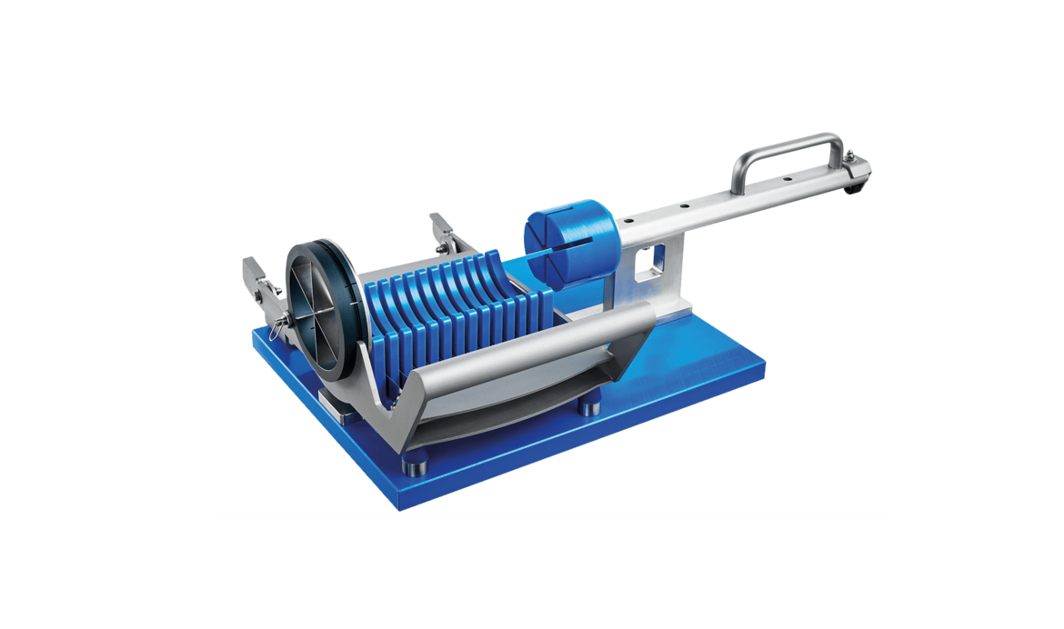 Manual pineapple chunk cutter MPC 100 from KRONEN for lightning-fast cutting of punched and cored pineapple cylinders into uniform pieces.
