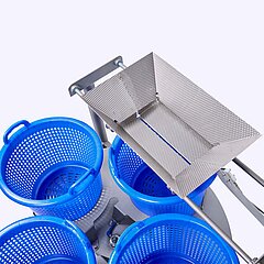 Carrousel à paniers automatisé KAB sans paniers – remplissage de paniers par ex. en aval des laveurs GEWA Plus ou HEWA